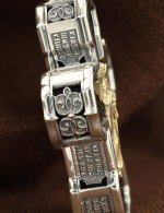 Крест из серебра 925 пробы и золота 585 пробы с эбеновым деревом