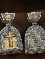 Образок из серебра 925 пробы и золота 585 пробы с сапфиром